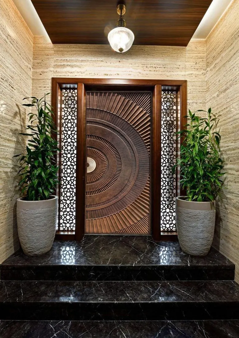 Sculptural carved entrance door
